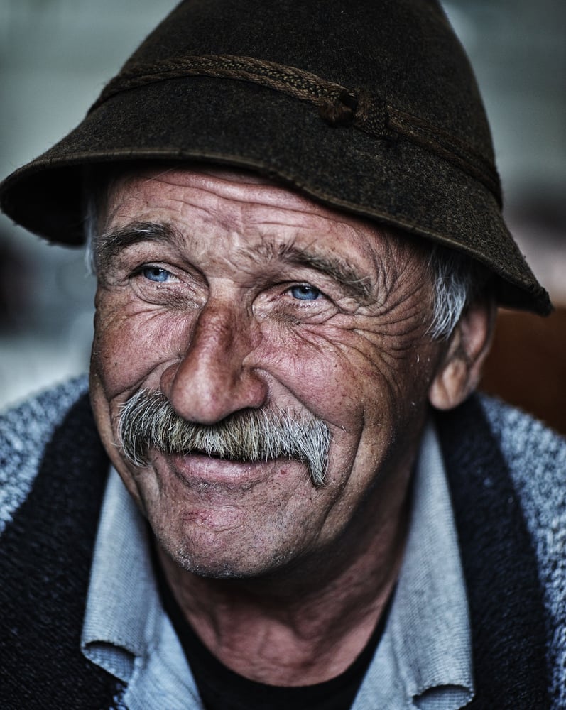 Portrait of old man with mustache